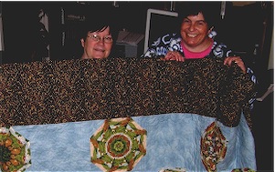 Suzi Stephens and Jenny Church with Quilt for Malawi
